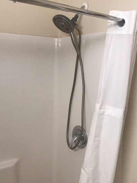 Combined shower/tub, hair dryer, towels, soap