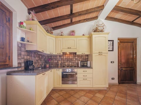 Cabinetry, Countertop, Kitchen, Wood, Door, Kitchen Stove, Kitchen Appliance, Purple, Home Appliance, Flooring