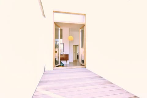 The sunset terrace: view on the living room of the first floor