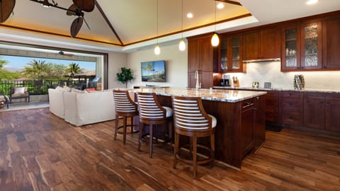 Mauna Kea Sunrise has a large open concept main floor living room including pocket doors that open up to a large covered outdoor living area called a Lanai