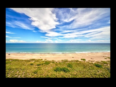 On the beach, sun loungers, beach towels