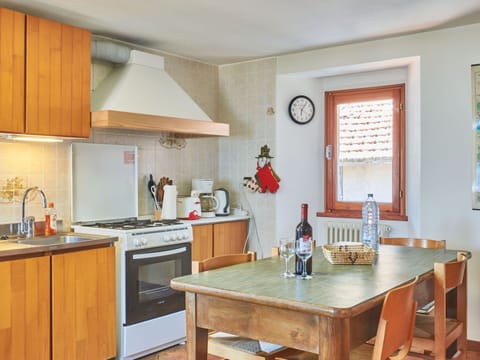 Property, Cabinetry, Furniture, Table, Countertop, Window, Wood, Lighting, Interior Design, Kitchen