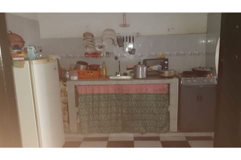 Fridge, stovetop, coffee/tea maker, electric kettle