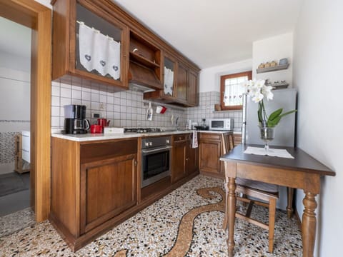 Cabinetry, Furniture, Countertop, Property, Building, Wood, Drawer, Sink, Kitchen Stove, Kitchen Appliance