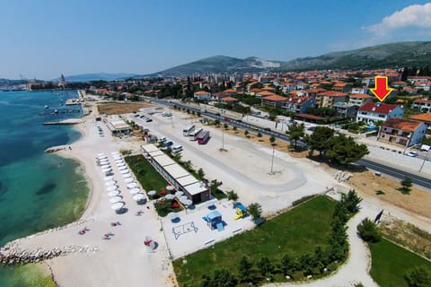 On the beach, sun loungers