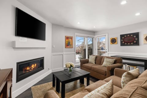 A dining table for 6 and breakfast bar for 4 provides ample dining seating for your group to enjoy a meal together.