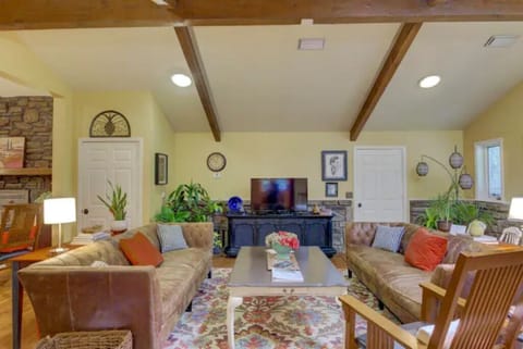 Large cozy family room with lots of room to stretch out with 2 couches & chair!