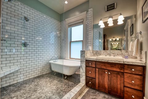 Master bath with dual shower heads and relaxing soaking tub