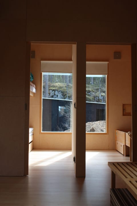 Two bedrooms separated by sliding doors