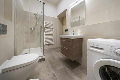 Bathroom I. with shower, toilet, bidet and washing machine