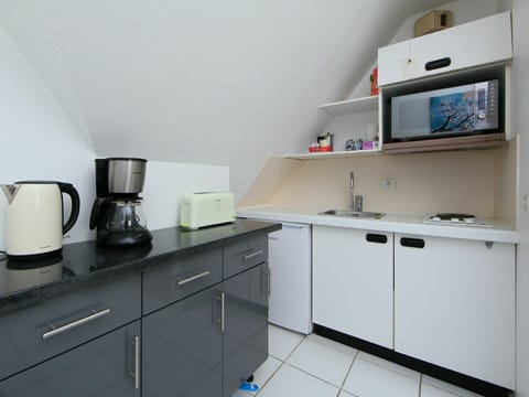 Cabinetry, Tap, Countertop, Building, Furniture, Kitchen, Drawer, Kitchen Appliance, Kitchen Stove, Interior Design