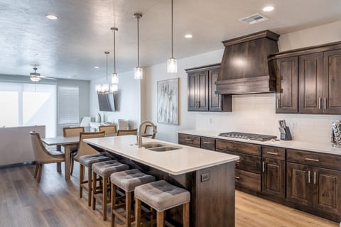 Kitchen - The kitchen is fully stocked with all the dishes, cookware, baking pans, and cutlery you will need for meal preparations and includes stainless steel appliances and granite counter tops.