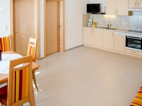 Floor, Room, Property, Flooring, Furniture, Tile, Yellow, Interior Design, Building, Laminate Flooring