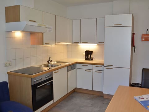 Cabinetry, Kitchen Sink, Countertop, Sink, Property, Tap, Kitchen Stove, Kitchen, Kitchen Appliance, Wood