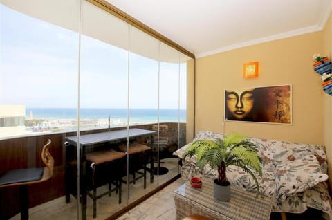 Beautiful terrace with outdoor dining area for four guests and sea views