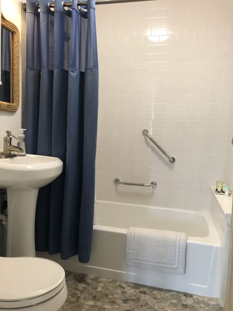 Combined shower/tub, hair dryer, towels, soap