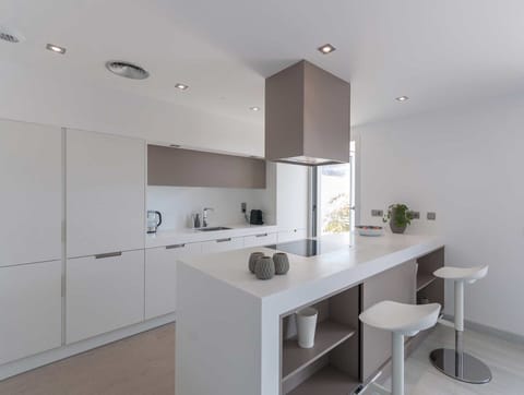 Sleek and equipped kitchen in rental in Spain