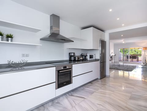 Sleek and fully-equipped kitchen in beach rental