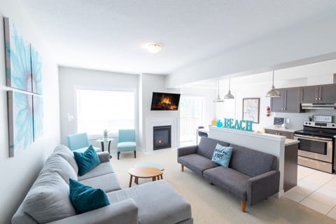 main floor open concept living, 50'Smart TV, Gas fireplace  