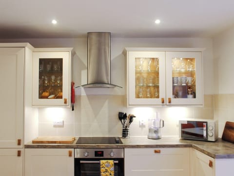 Well equipped kitchen/ dining room | Rhunahaorine Cottage, Tayinloan, near Tarbert