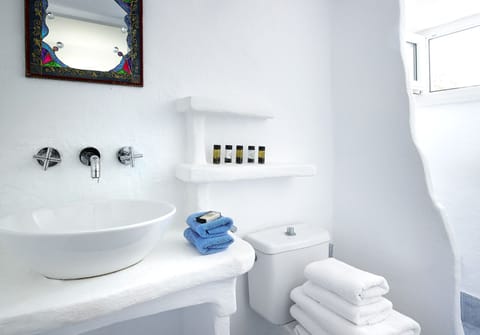 Shower, eco-friendly toiletries, hair dryer, towels