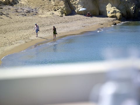 Beach nearby, sun loungers