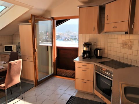 Cabinetry, Building, Furniture, Gas Stove, Countertop, Kitchen Appliance, Cooktop, Home Appliance, Wood, Kitchen