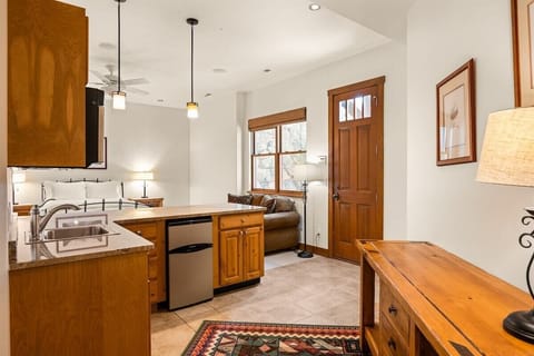 Bottom level fully-enclosed apartment with kitchenette