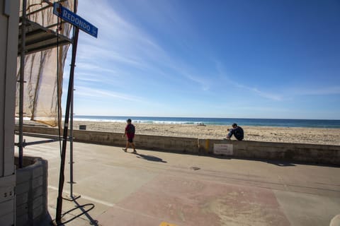 On the beach, sun loungers, beach towels