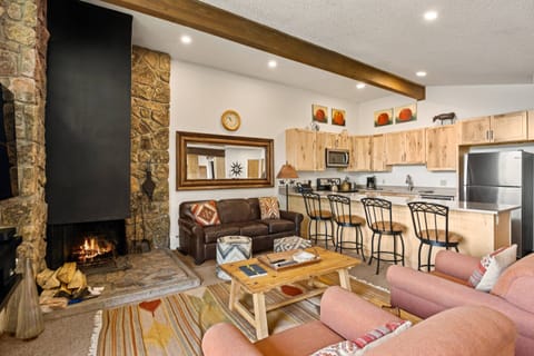 The kitchen is recently remodeled with new appliances, beautiful cabinetry and countertops.