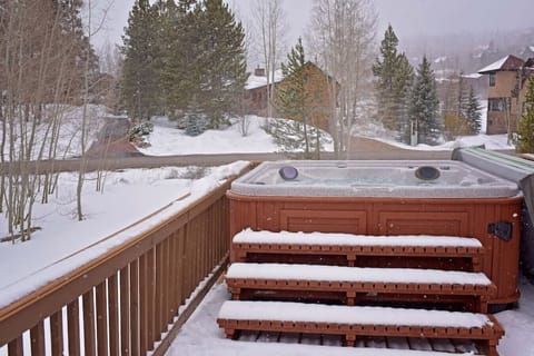 Enjoy mountain peak views while relaxing in this four-person hot tub.