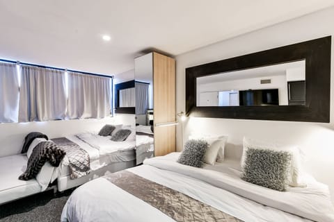 7 bedrooms, memory foam beds, in-room safe, desk