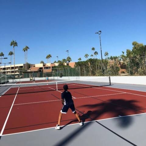 Your Tennis Haven: Less than a stone's throw away from our villa.