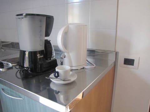 Fridge, microwave, coffee/tea maker, electric kettle