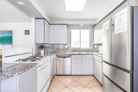 Kitchen is fully-stocked with dishes, cooking, baking and meal prep gear. All standard large and small appliances included. See listing description for more supply details.