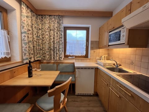 Brown, Kitchen Sink, Cabinetry, Countertop, Tap, Furniture, Sink, Window, Blue, Plumbing Fixture