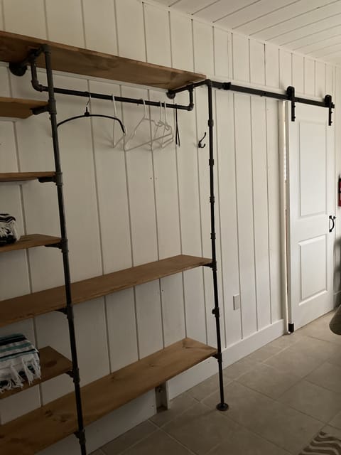 clothes storage and barn style bedroom door