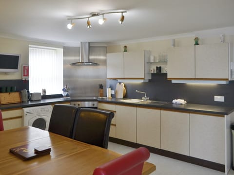Fully appointed kitchen with dining area | Seabreezes - Scott Holiday Cottages, Portknockie