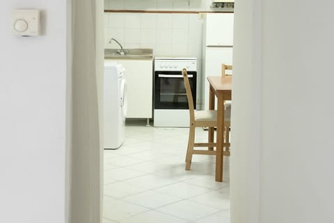 Fridge, oven, dining tables