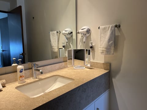 Combined shower/tub, hair dryer, towels, soap