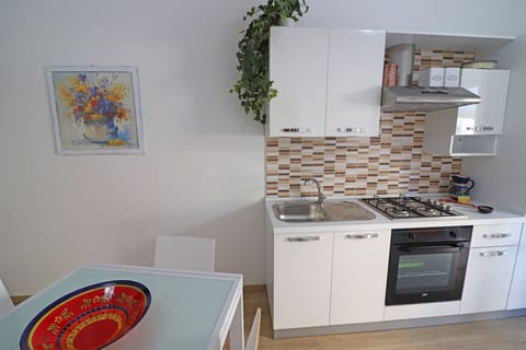 Fridge, oven, stovetop, highchair