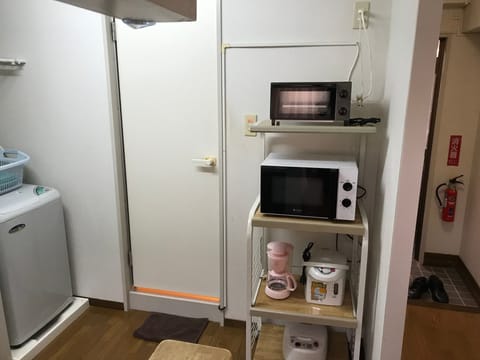 Fridge, microwave, stovetop, cookware/dishes/utensils