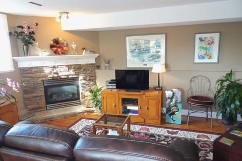 Open style living area.  Cozy gas fireplace
