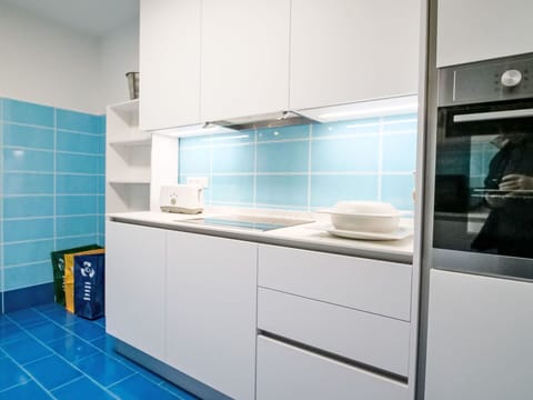 Major Appliance, Flooring, Kitchen, Countertop, Kitchen Appliance, Interior Design, Floor, Cabinetry, Tile, Room