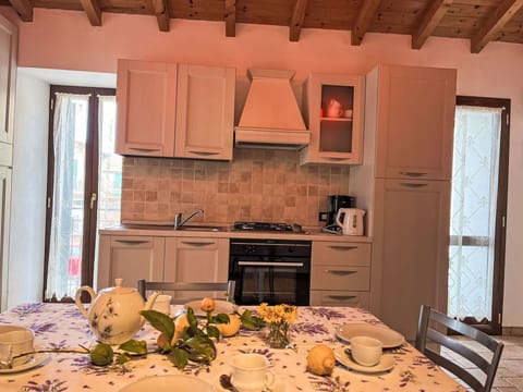 Furniture, Interior Design, Wood, Flooring, Kitchen, Countertop, Kitchen Appliance, Kitchen & Dining Room Table, Room, Floor