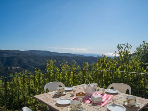 Sky, Table, Furniture, Dishware, Outdoor Furniture, Outdoor Table, Linens, Tablecloth, Mountain Range, Hill Station