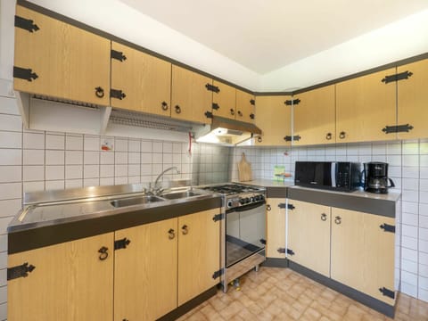 Tap, Countertop, Cabinetry, Kitchen Sink, Sink, Kitchen Appliance, Kitchen Stove, Plumbing Fixture, Kitchen, Wood