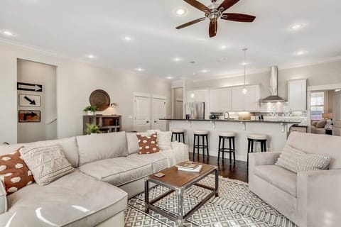 Our downstairs living space is as cozy as they come! An open living --> kitchen lends itself to good conversation & the comforts of home! Featuring bar seating & all new appliances in the kitchen plus plenty of pillows & blankets in the living room. 