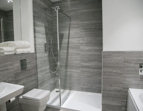 Combined shower/tub, hair dryer, towels, soap