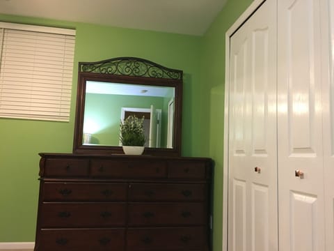 Plenty of storage space with full closet at your fingertips and 60” Sm Ft Screen